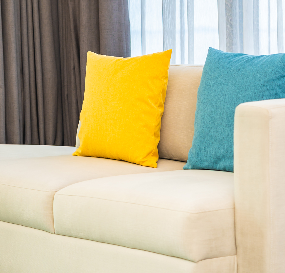 colorful pillows beige sofa